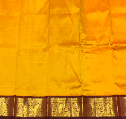 Mango Yellow Shade Pure Kanchipuram Kids Pattu Pavadai with Contrast Border for Newborn to 2 Years
