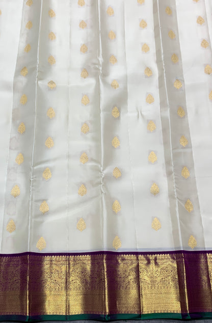 Pure Kanchipuram Silk Off White Colour with Magenta and Golden Zari Border