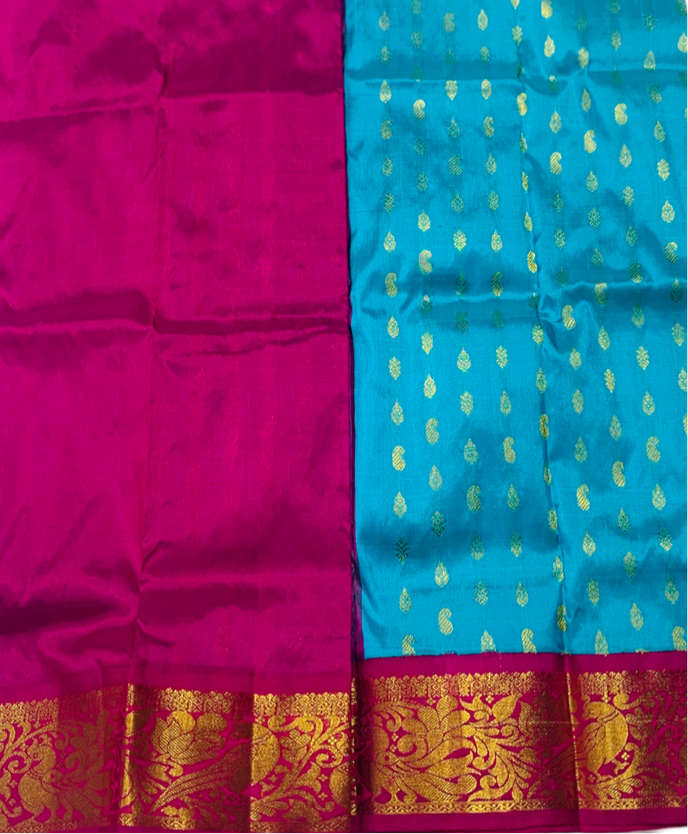 Sky Blue shade Pure kanchipuram Kids Pattu Pavadai with contrast border for newborn to 2 Years