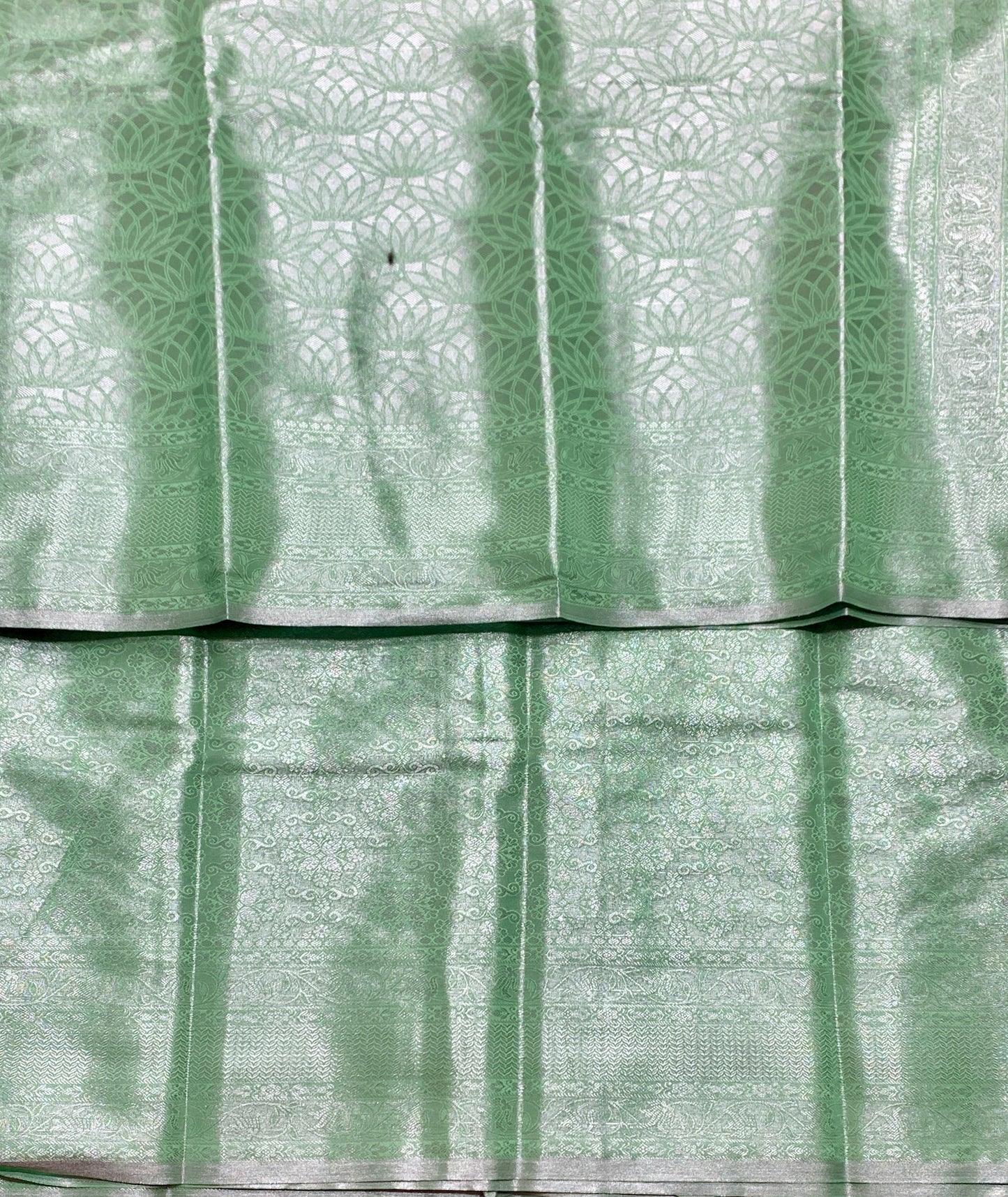 Fancy Tissue Saree Pista Green Colour with Self Design Border