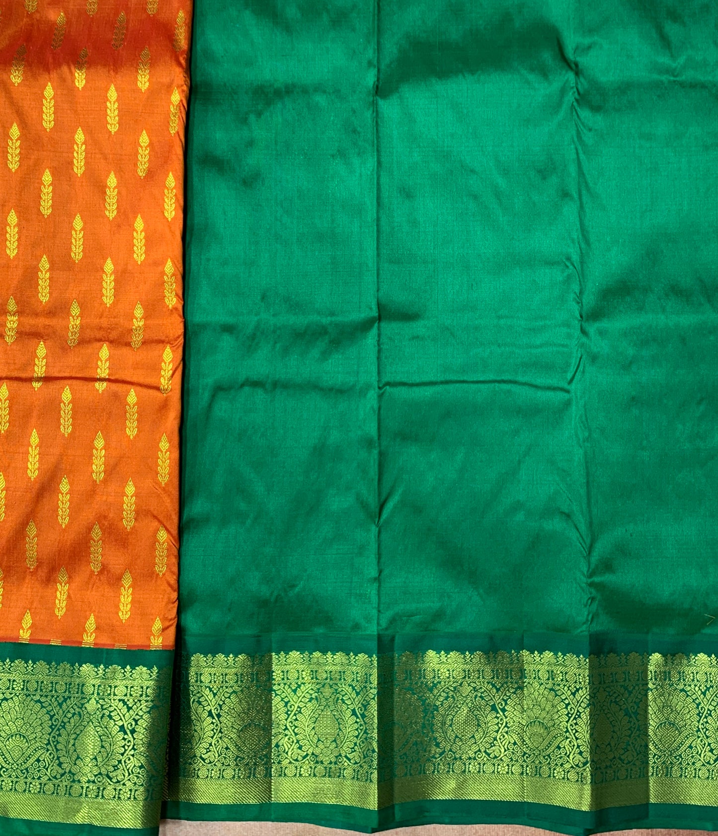 Orange Shade Pure kanchipuram Kids Pattu Pavadai with Contrast Border for Newborn to 2 Years