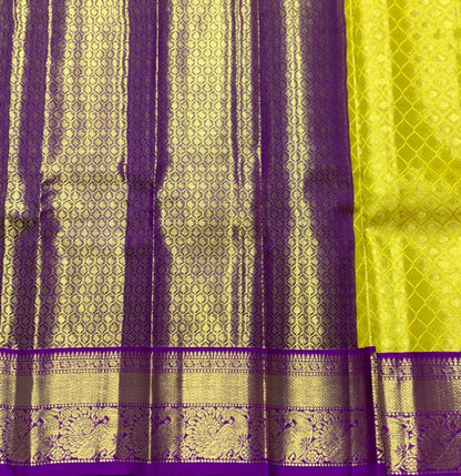 Yellow Shade Pure Kanchipuram Kids Pattu Pavadai with Contrast Border for Newborn to 2 Years