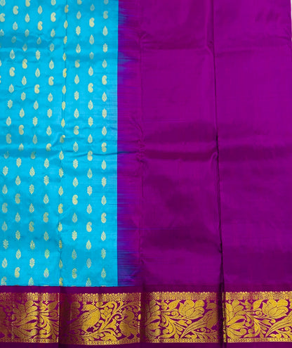 Sky Blue shade Pure kanchipuram Kids Pattu Pavadai with contrast border for newborn to 2 Years