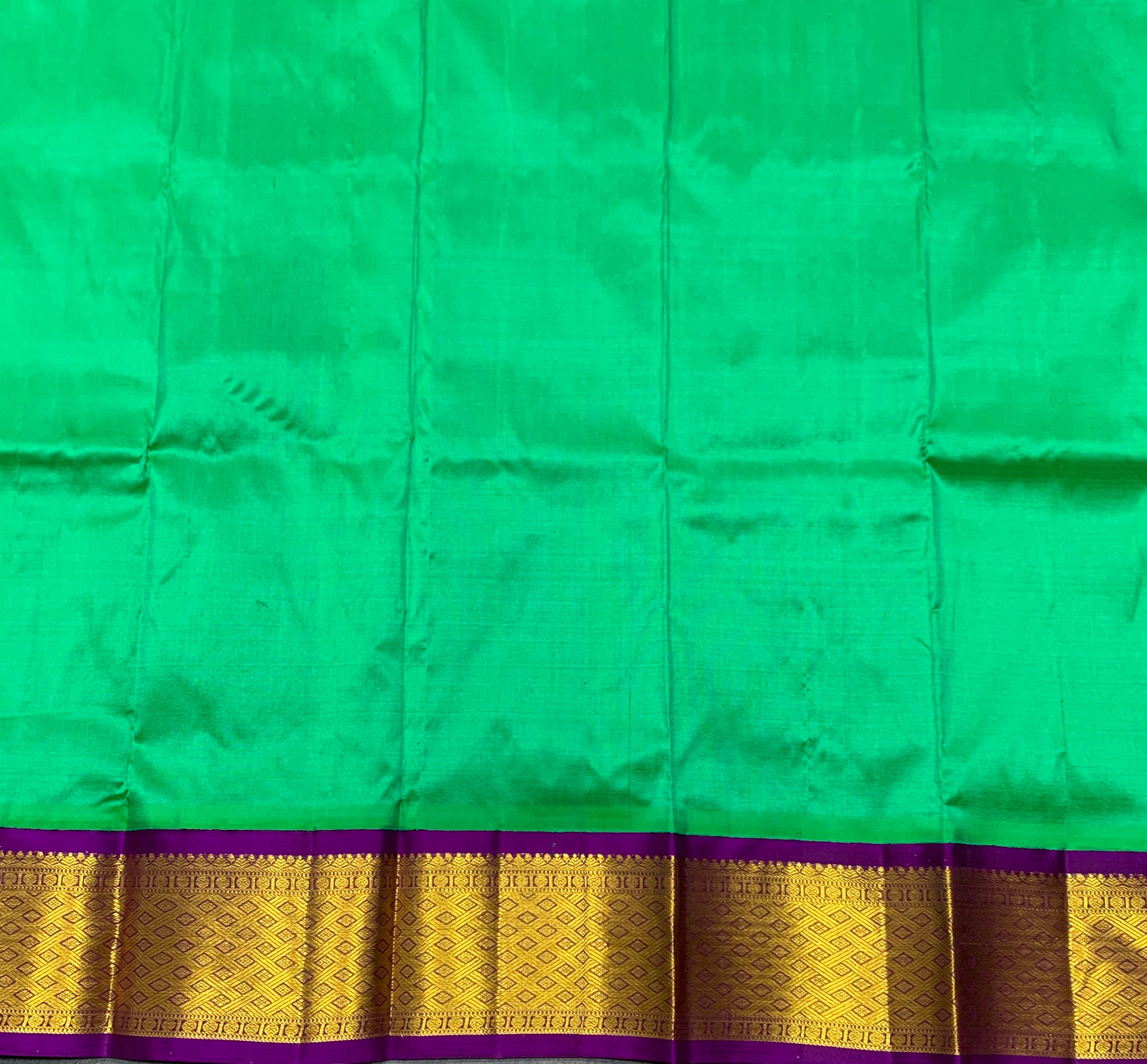 Light Green Shade Pure Kanchipuram Kids Pattu Pavadai with Contrast Border for Newborn to 2 Years