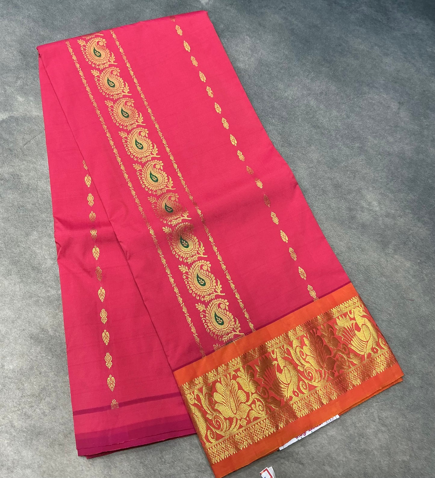 Tomato Pink shade Semi Silk Kids Pattu Pavadai with Contrast border for age above 10 years
