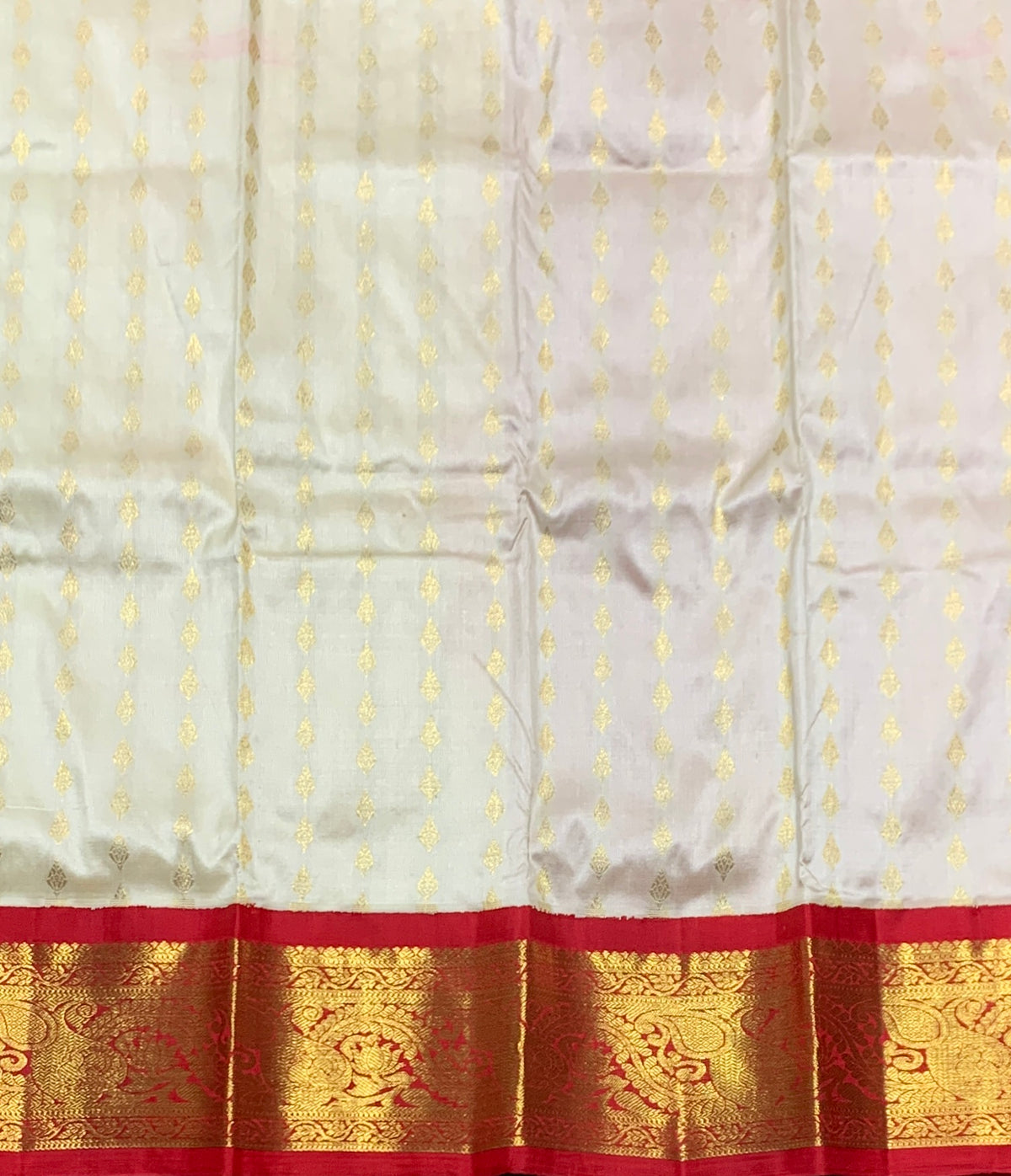 Ivory Shade Pure Kanchipuram Kids Pattu Pavadai with Contrast Border for Newborn to 2 Years