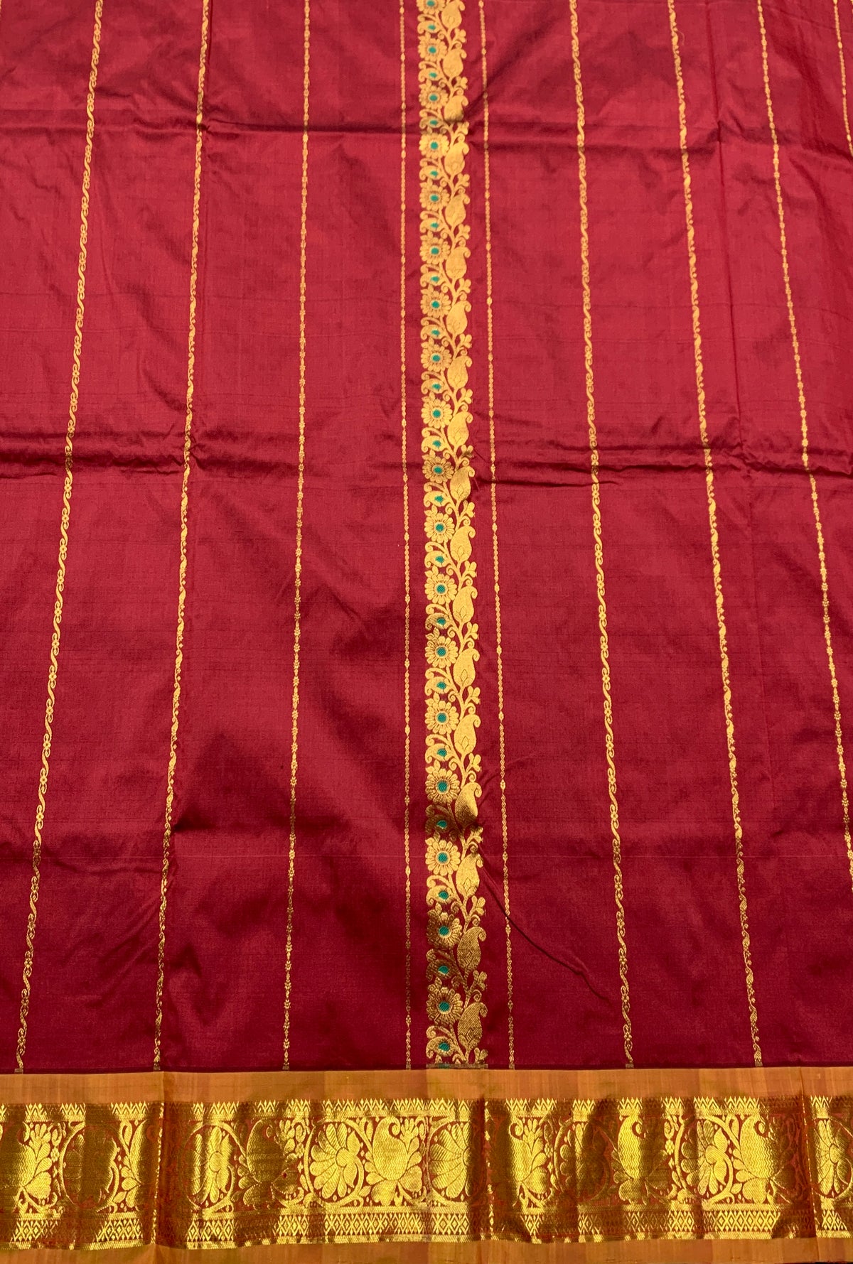 Maroon shade Semi Silk Kids Pattu Pavadai with Contrast border for age above 10 years