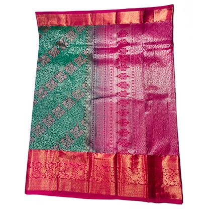 Bottle Green shade Soft kanchi pattu with Pink Border.