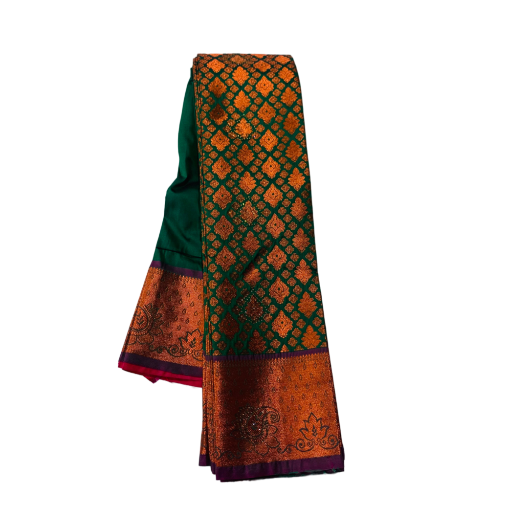 Green Soft kanchi pattu with Copper and Purple Border.