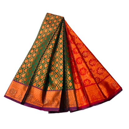 Green Soft kanchi pattu with Copper and Purple Border.