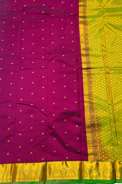 Purple shade Semi Silk Saree with Green Border with Lotus Design