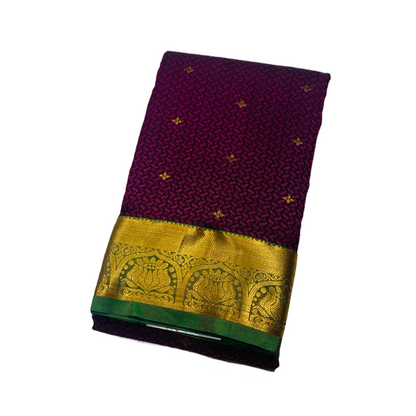 Purple shade Semi Silk Saree with Green Border with Lotus Design