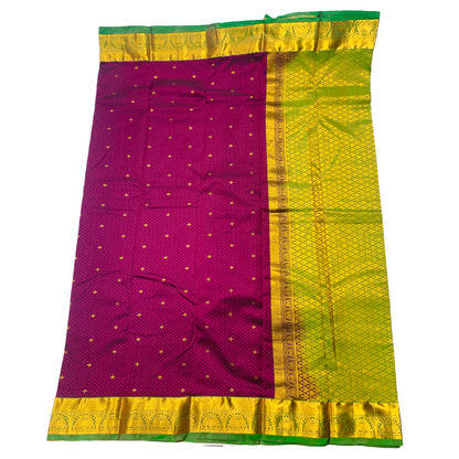 Purple shade Semi Silk Saree with Green Border with Lotus Design