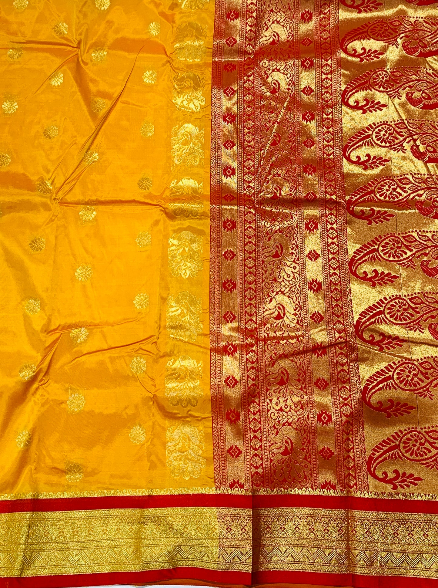 Mango Yellow shade saree with Golden and Red Border