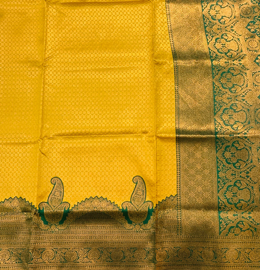 Golden Yellow shade saree with Green Border