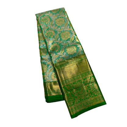 Golden Light Green shade Soft kanchi pattu with Golden Border Flower Design