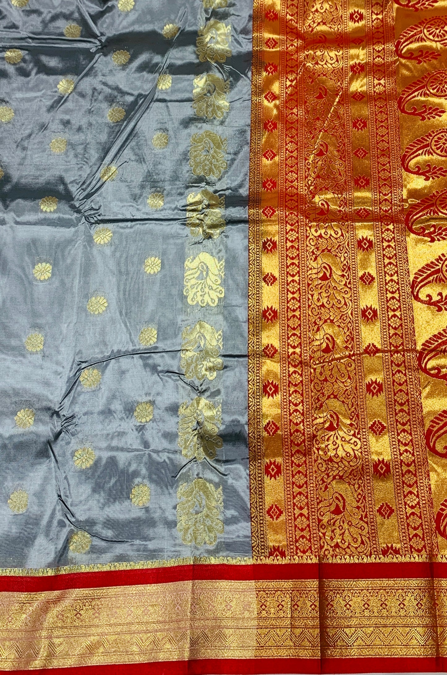 Gray shade saree with Golden and Red Border