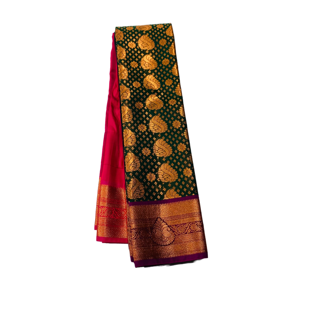 Green  Shade Soft kanchi pattu with Copper and Purple Border.