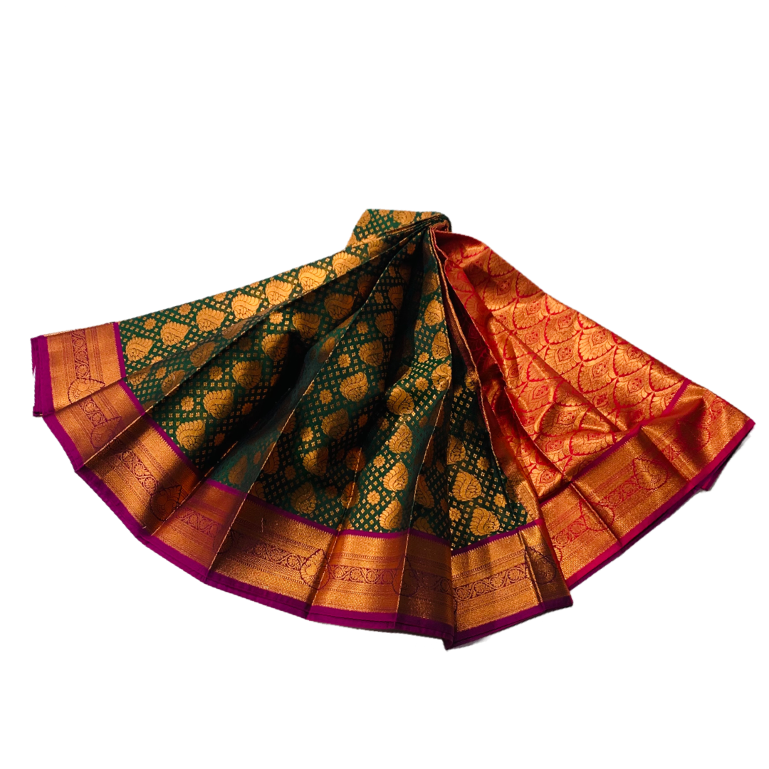 Green  Shade Soft kanchi pattu with Copper and Purple Border.