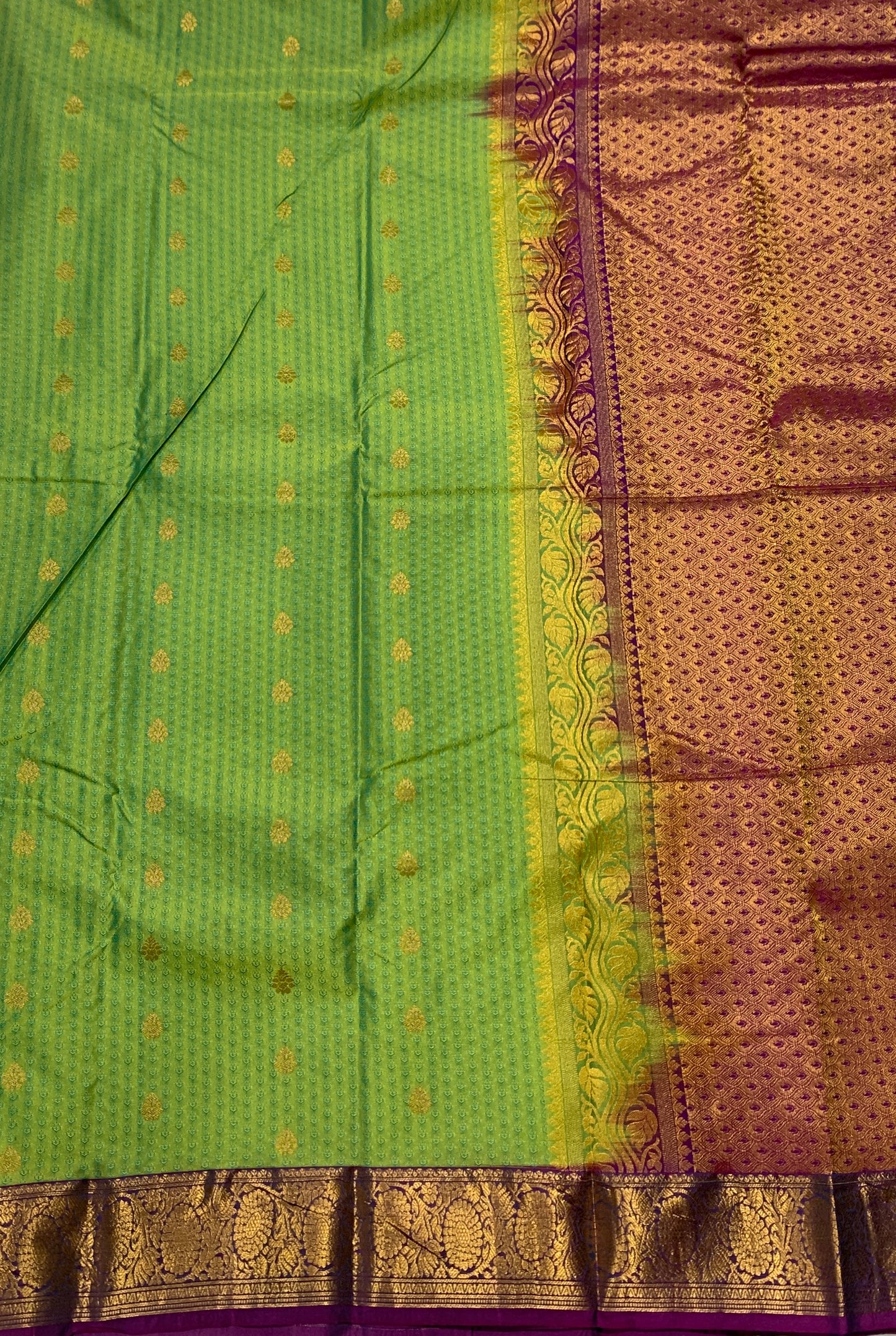 Green shade Semi Silk Saree with Purple Border with Floral Design