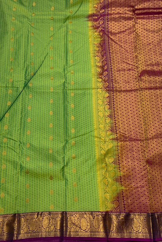 Green shade Semi Silk Saree with Purple Border with Floral Design