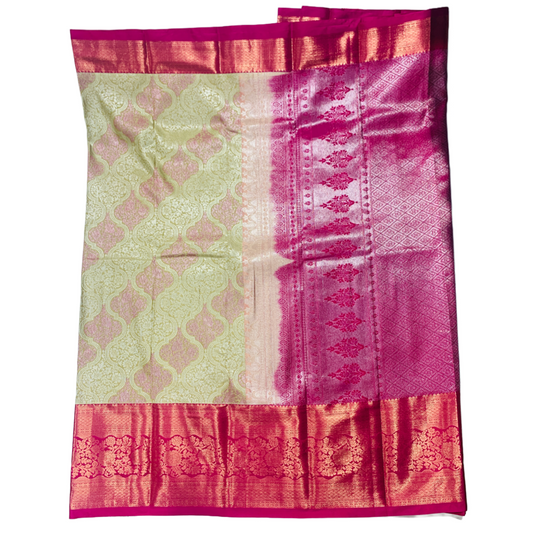 Green shade Soft kanchi pattu with Pink Border.