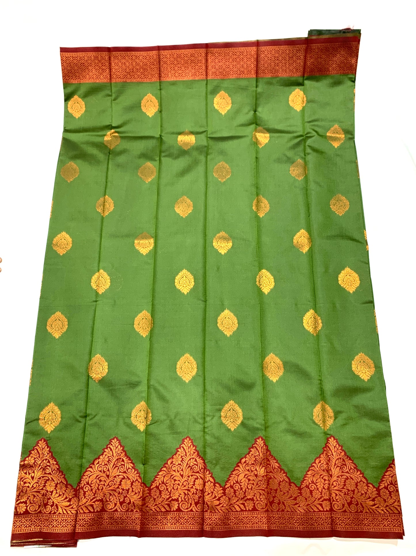 Green shade saree with Copper Border with flower design