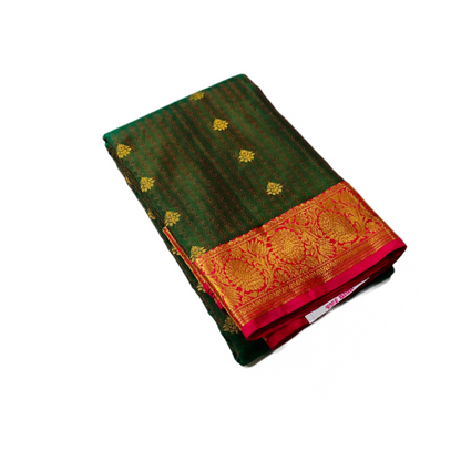 Green shade Semi Silk Saree with  Pink  border.