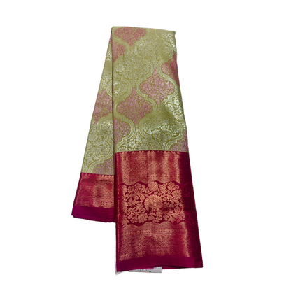 Green shade Soft kanchi pattu with Pink Border.