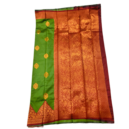 Green shade saree with Copper Border with flower design