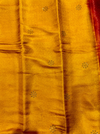 Golden Yellow shade kuberra pattu with Pink Pallu