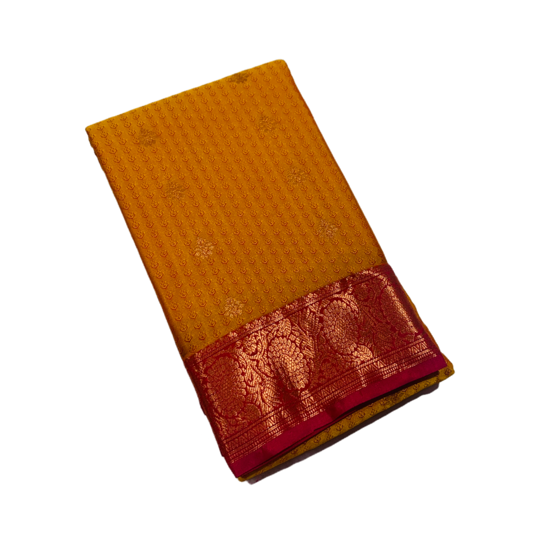 Golden Yellow shade Semi Silk Saree with Copper Border with Floral Design