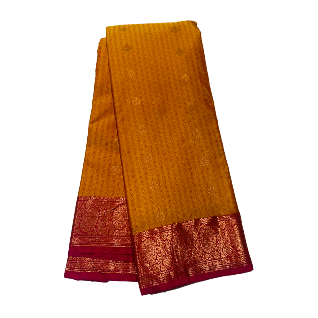 Golden Yellow shade Semi Silk Saree with Copper Border with Floral Design