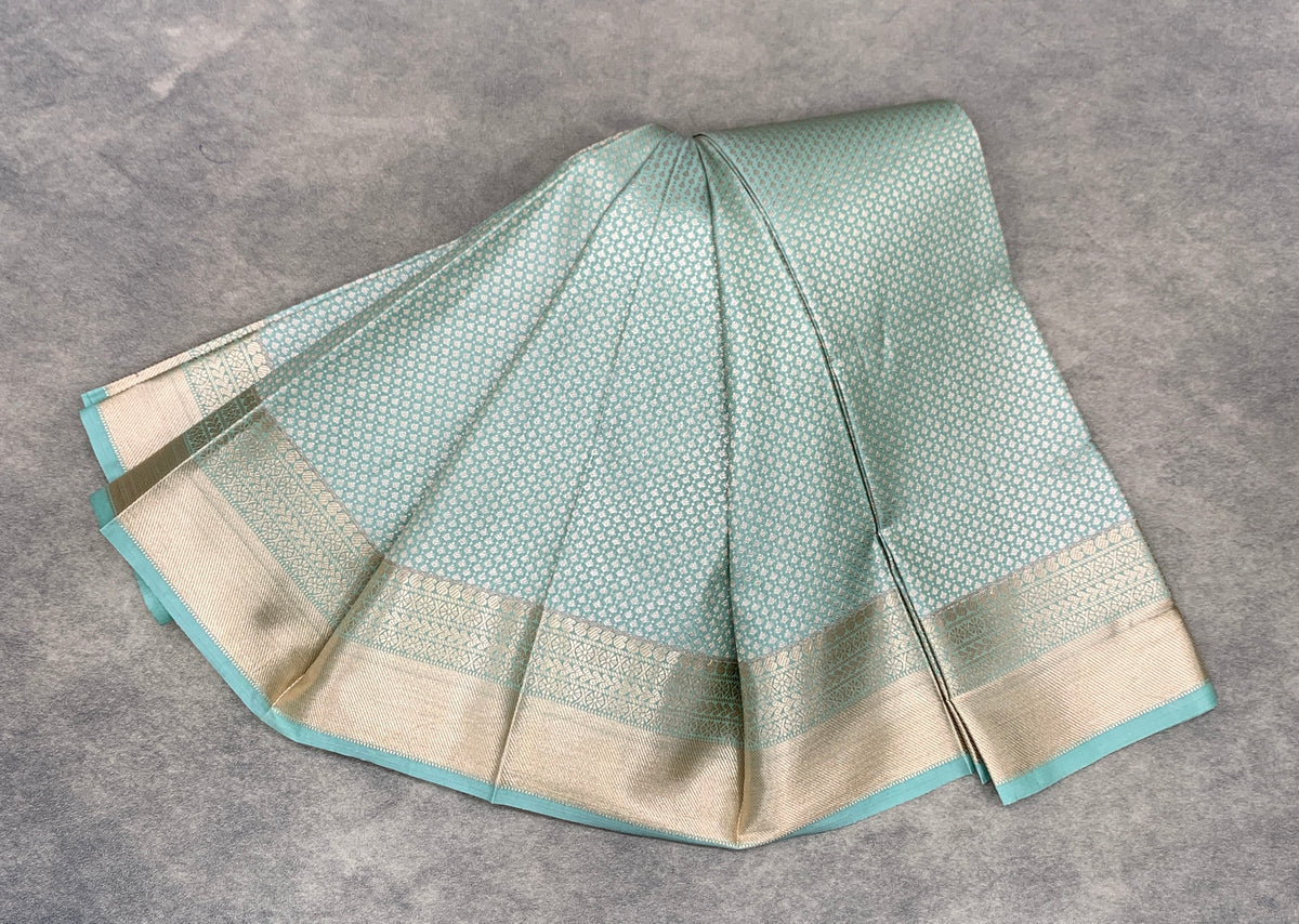 Fancy Tissue Saree Pastel Green Colour with Self Design Border