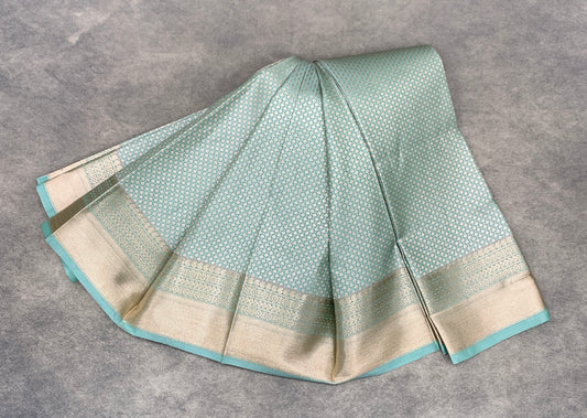 Fancy Tissue Saree Pastel Green Colour with Self Design Border