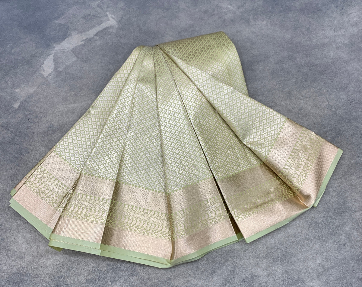 Fancy Tissue Saree Pista Green Colour with Self Design Border