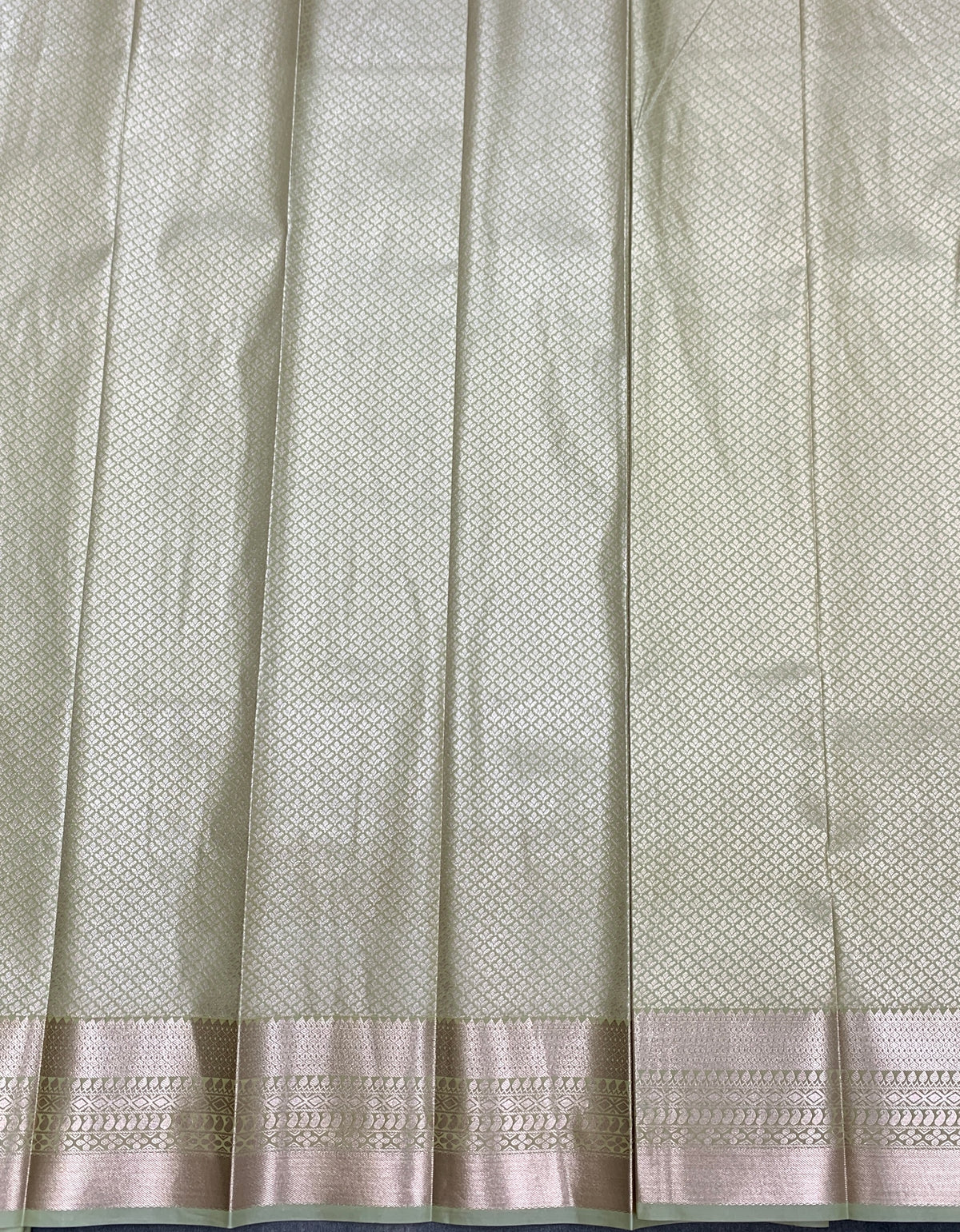 Fancy Tissue Saree Pista Green Colour with Self Design Border