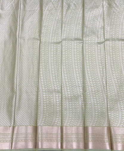 Fancy Tissue Saree Pista Green Colour with Self Design Border