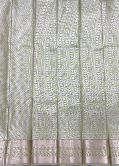 Fancy Tissue Saree Pista Green Colour with Self Design Border