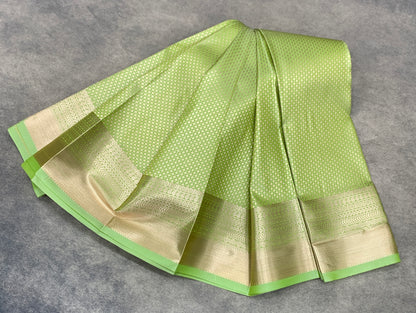 Fancy Tissue Saree Pista Green Colour with Self Design Border