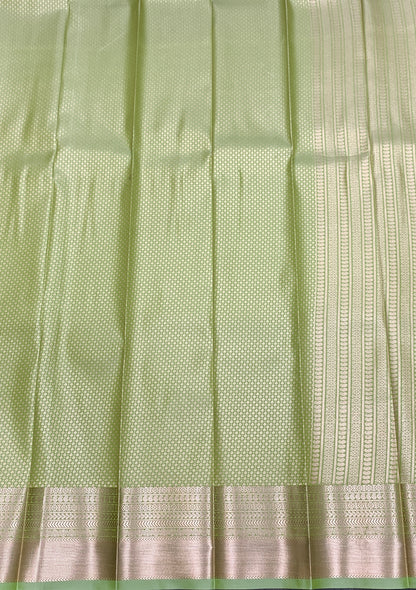 Fancy Tissue Saree Pista Green Colour with Self Design Border