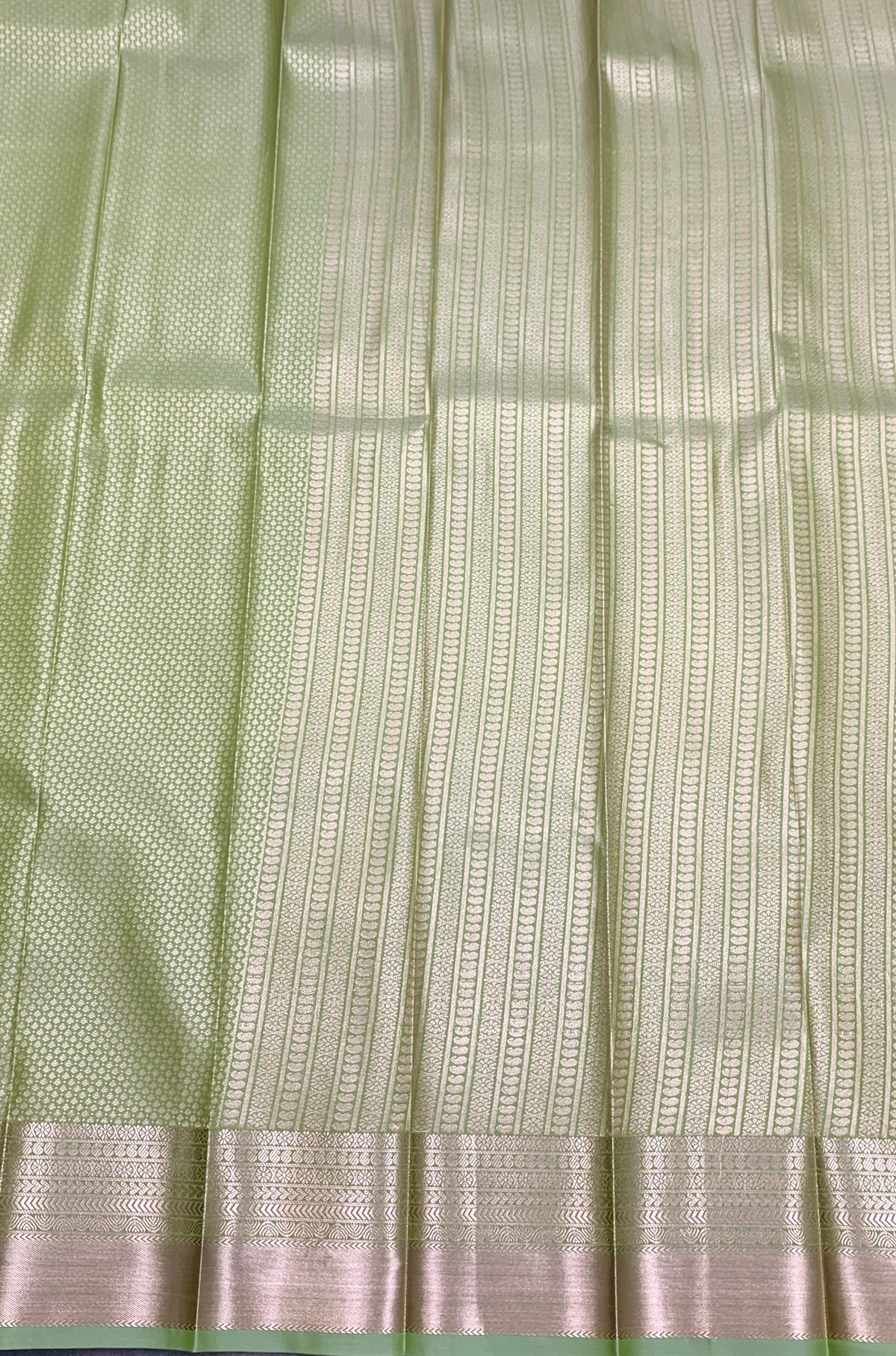 Fancy Tissue Saree Pista Green Colour with Self Design Border