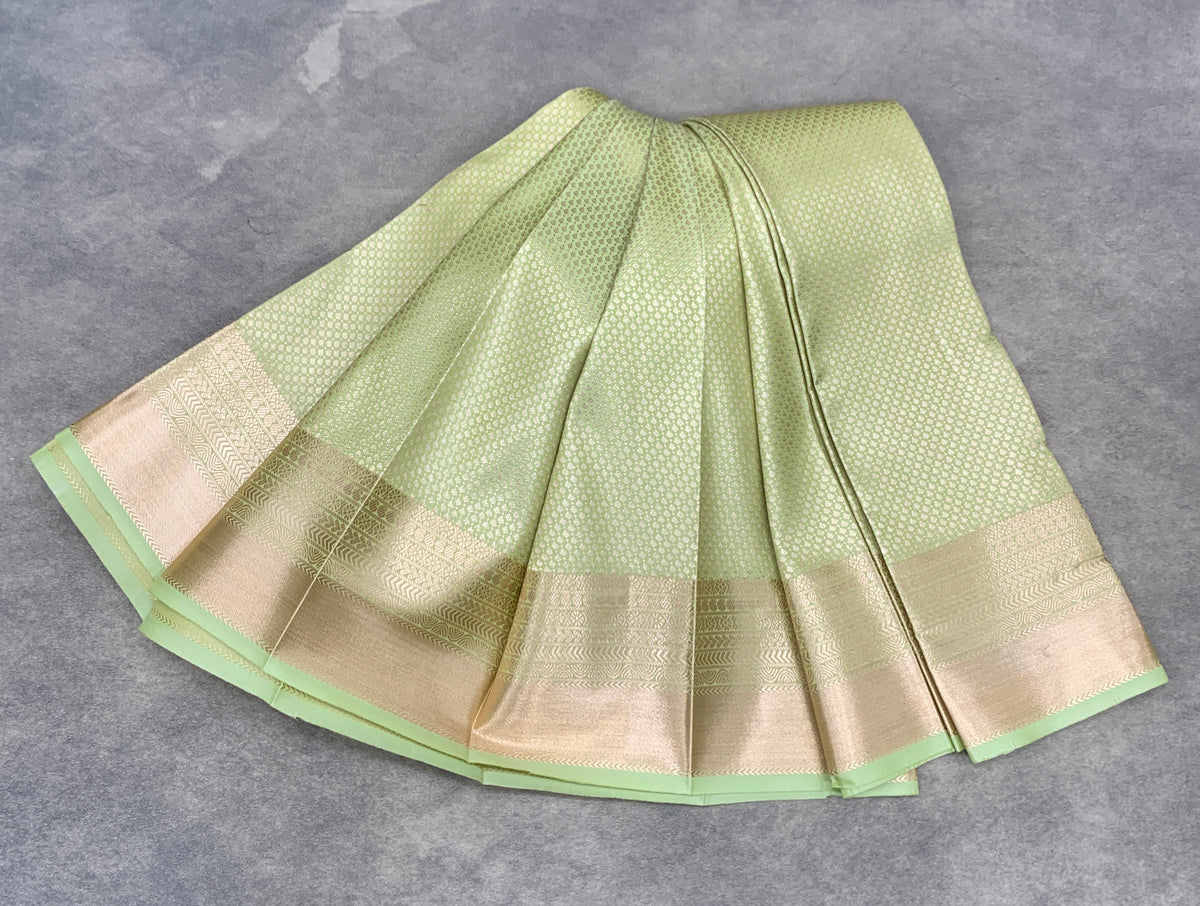 Fancy Tissue Saree Pista Green Colour with Self Design Border