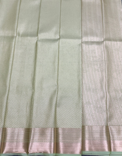 Fancy Tissue Saree Pista Green Colour with Self Design Border