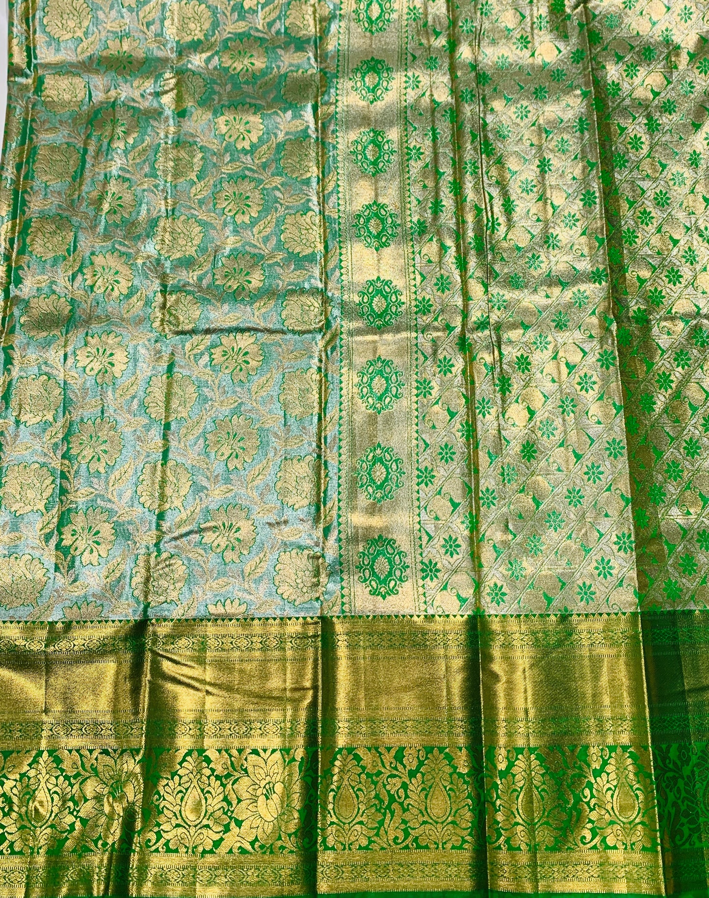 Golden Light Green shade Soft kanchi pattu with Golden Border Flower Design