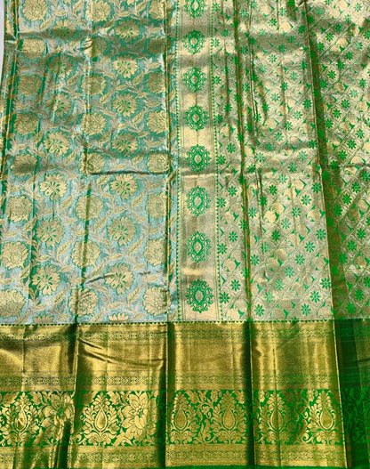 Golden Light Green shade Soft kanchi pattu with Golden Border Flower Design