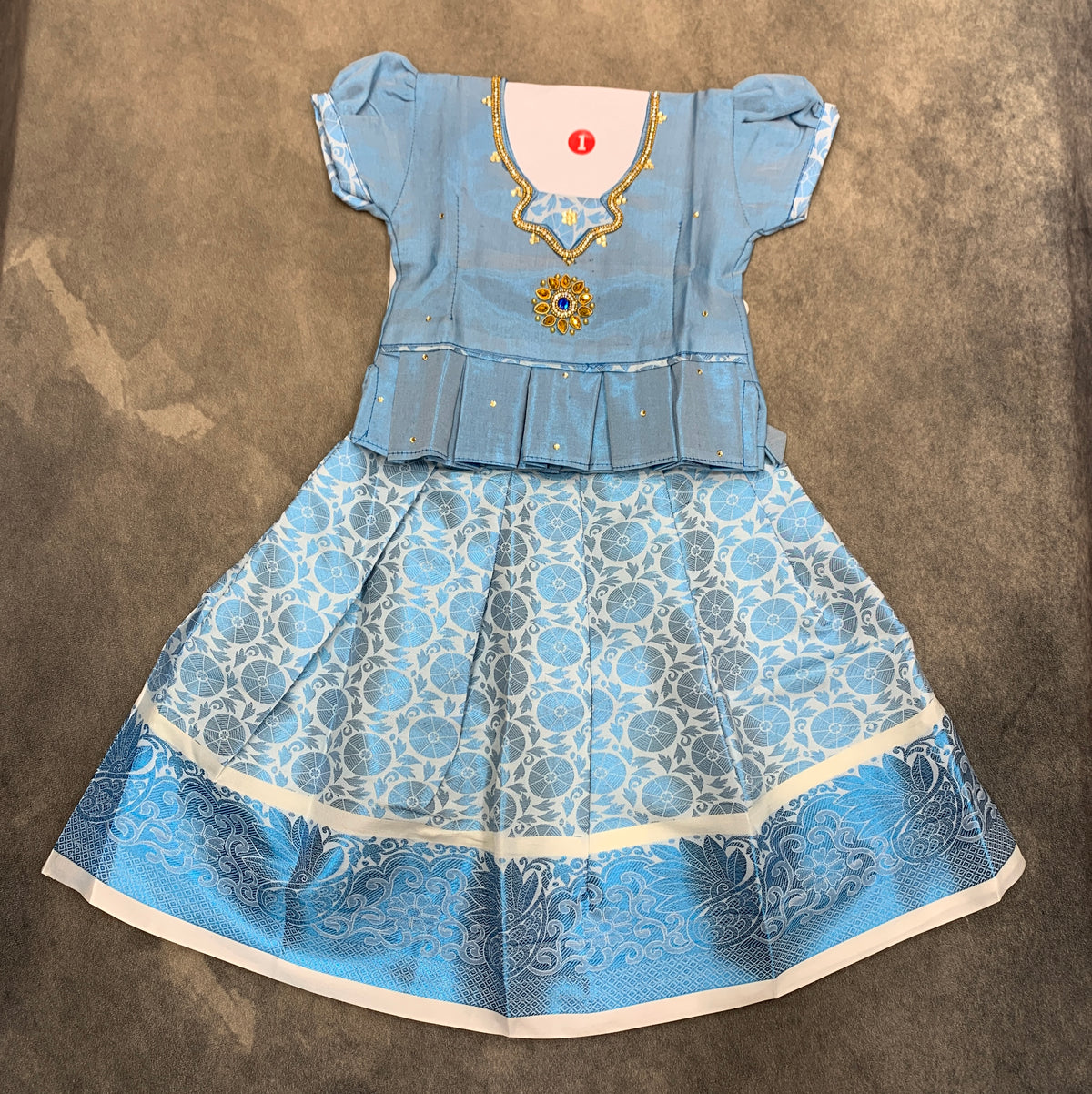 Ready To Wear Off White Colour Pavadai with Contrast Sky Blue Colour Blouse