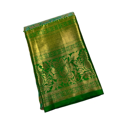 Golden Light Green shade Soft kanchi pattu with Golden Border Flower Design