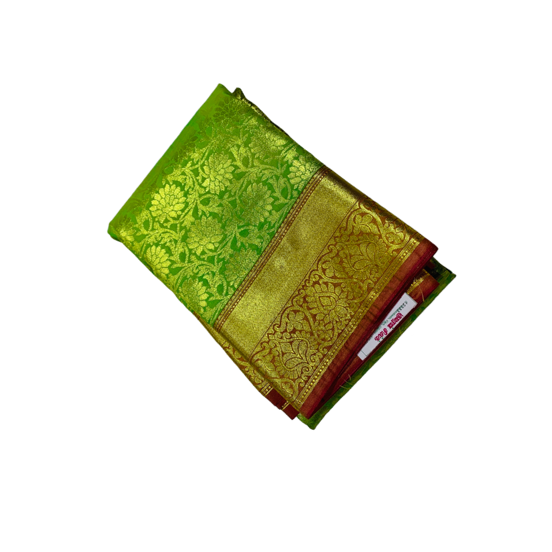 Light Green Shade Kanchipuram Silk Saree with Golden Border with Flower design.