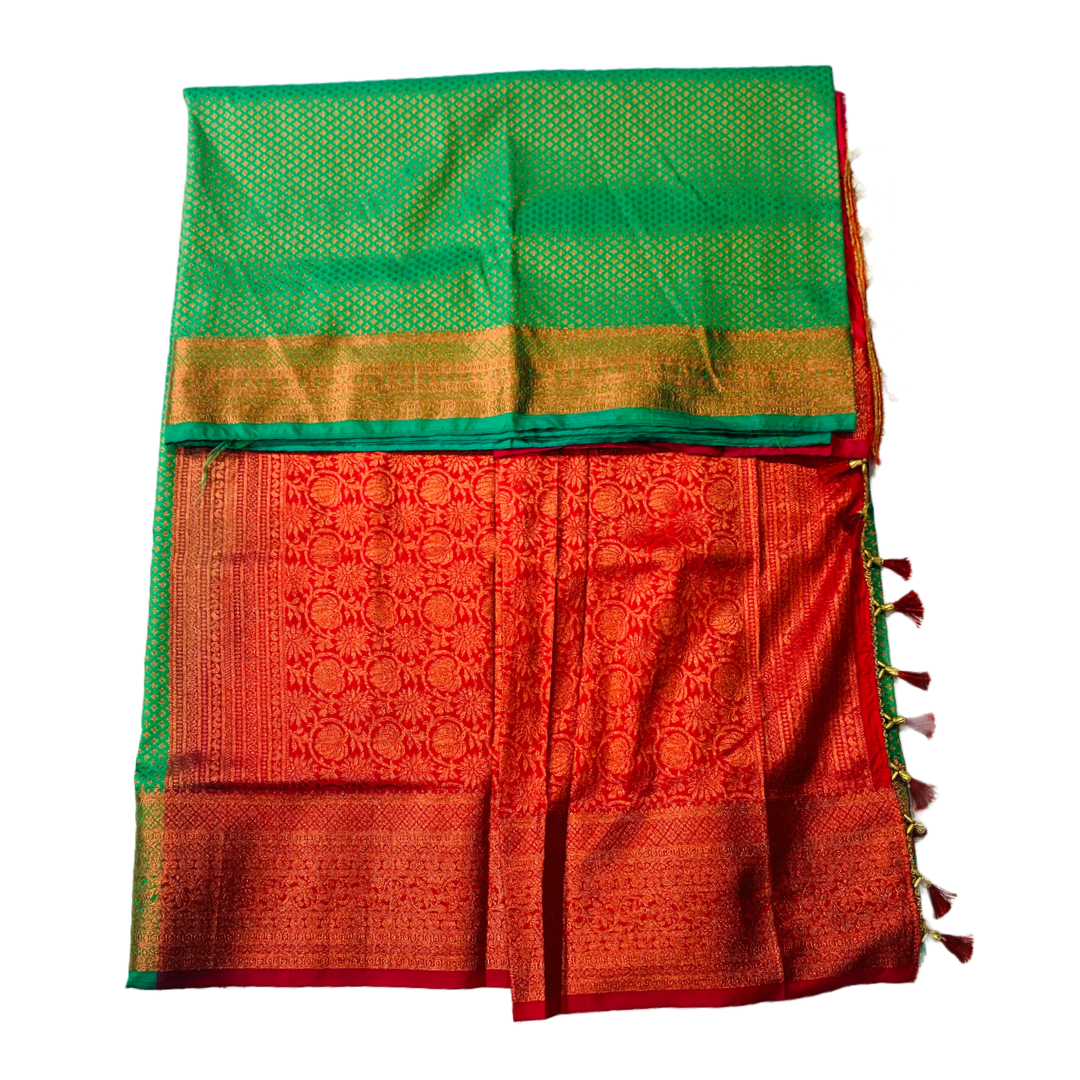 Light Green shade Soft kanchi pattu with Red Border with Unstitched blouse in Aari work.